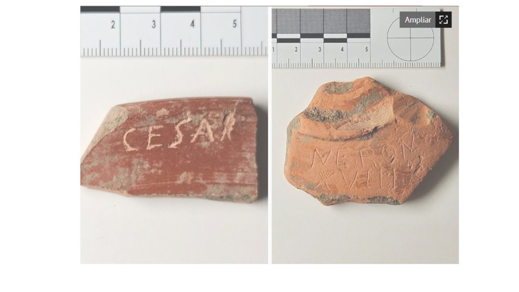 Fragmentos de cerámica con inscripciones “CÉSAR” y “NERON XVIIII”, hallados en el yacimiento arqueológico de Iruña-Veleia, con escalas métricas visibles.